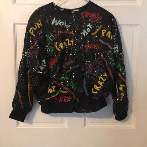 Zip up party jacket. Size Medium.